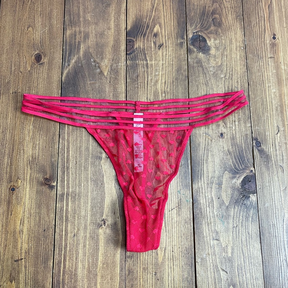 Victoria’s Secret size medium red mesh lace thong